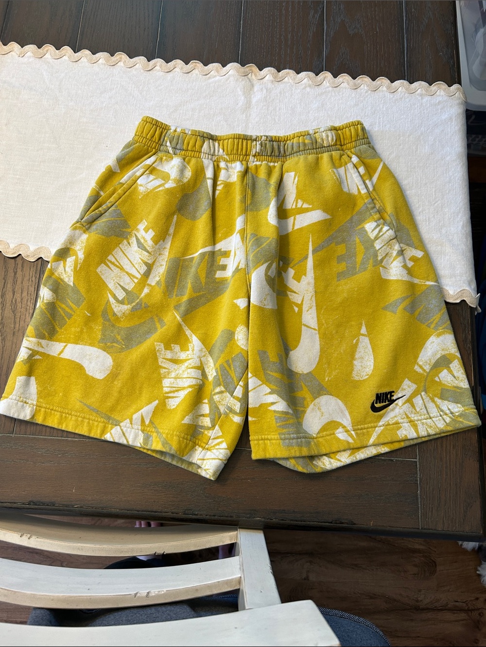 Nike Men's Yellow Allover Logo Athletic Shorts